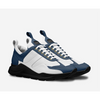 White and blue sneakers on a light grey background